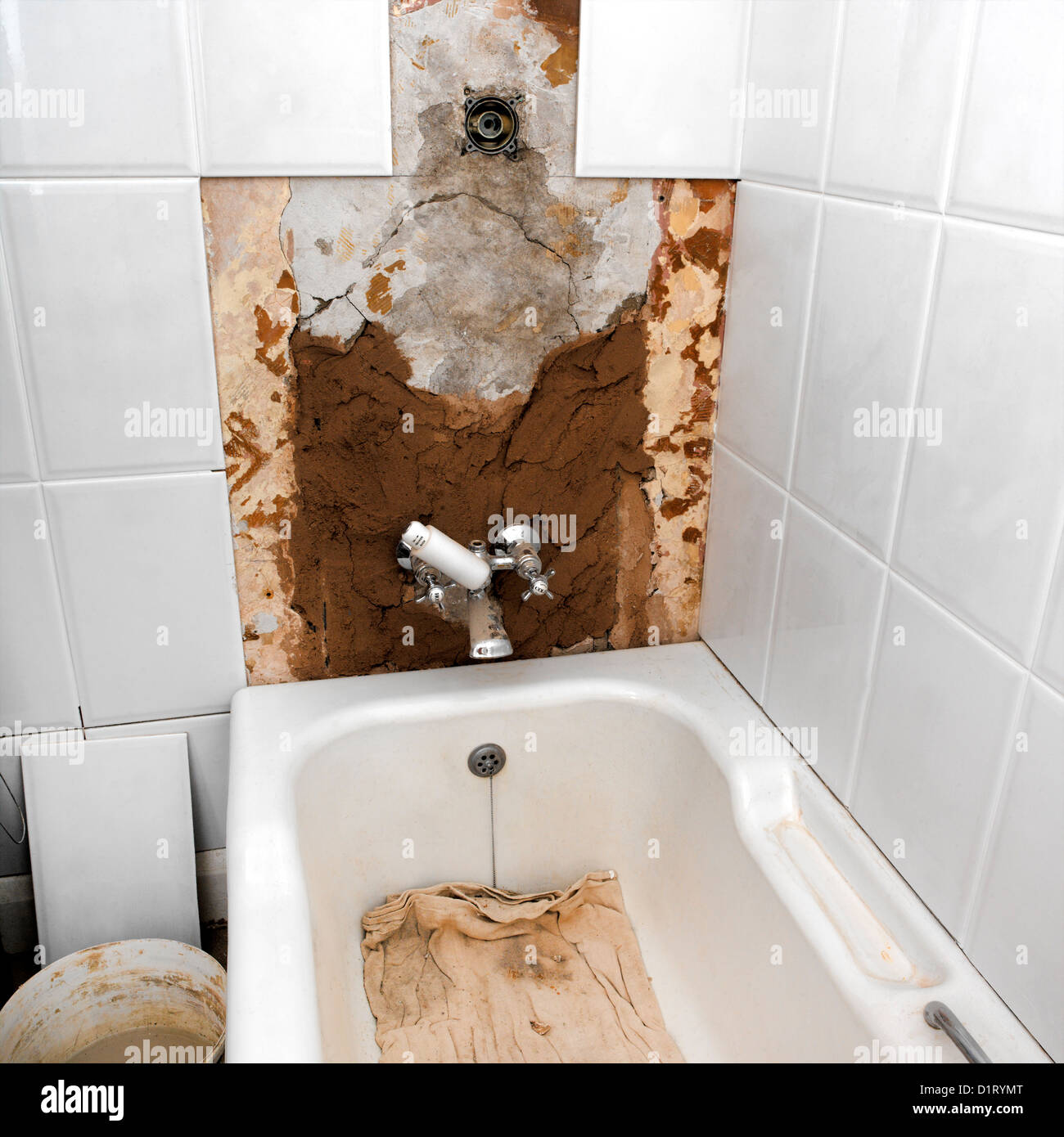 Installing New Bath Taps in New Bathroom Stock Photo