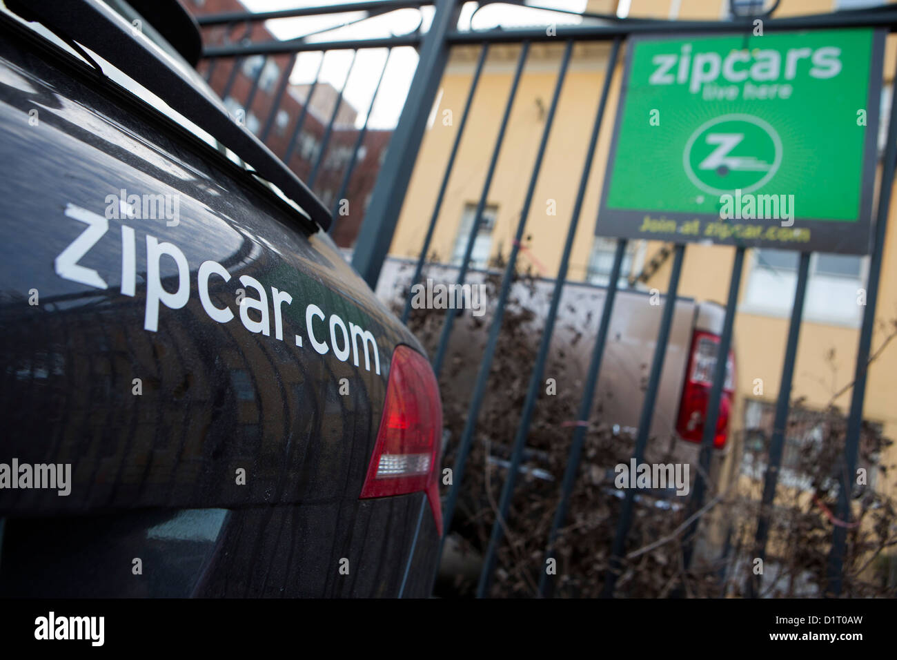 A Zipcar carshare location with car Stock Photo Alamy