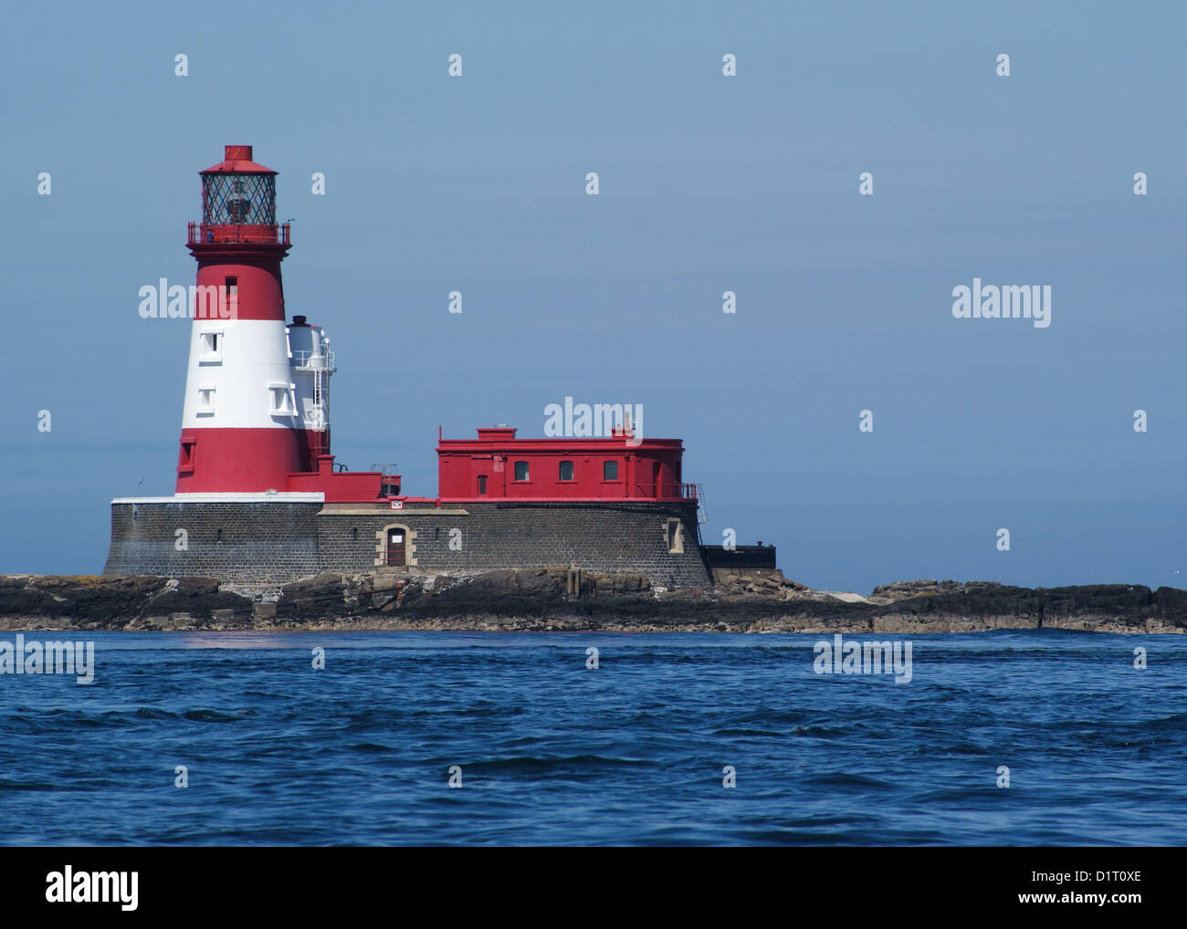 Red And White Longstone Lighthouse Stock Photo