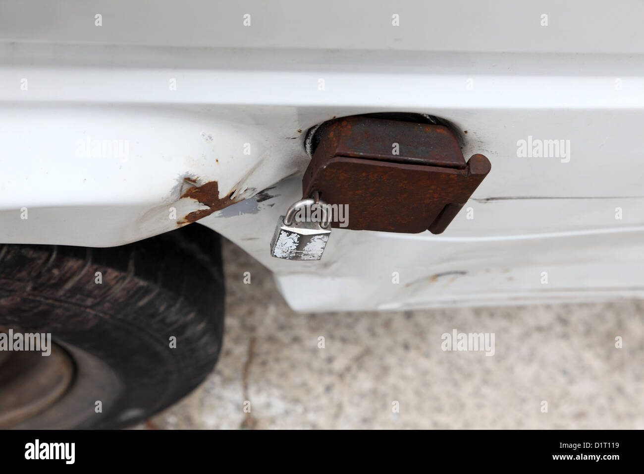 Fuel cap tank locked with a padlock Stock Photo