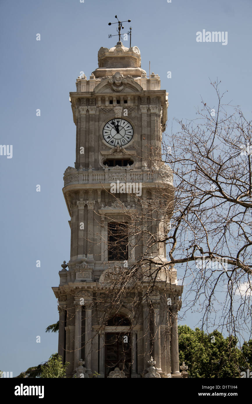 Historical Dolmabahce clock tower in Istanbul, Turkey ordered by