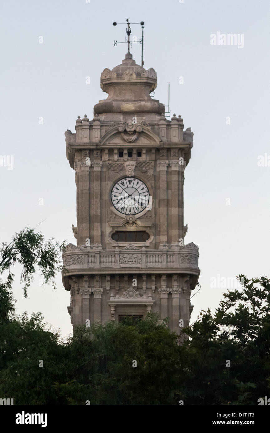 Historical Dolmabahce clock tower in Istanbul, Turkey ordered by