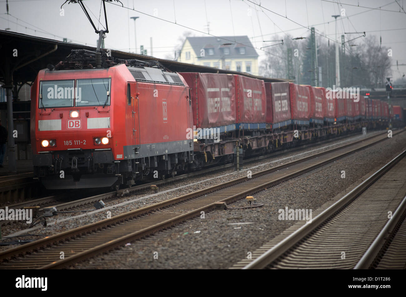 Freight train hauling Winner Spedition covered lorry wagons, Solingen, North Rhine-Westphalia, Germany. Stock Photo