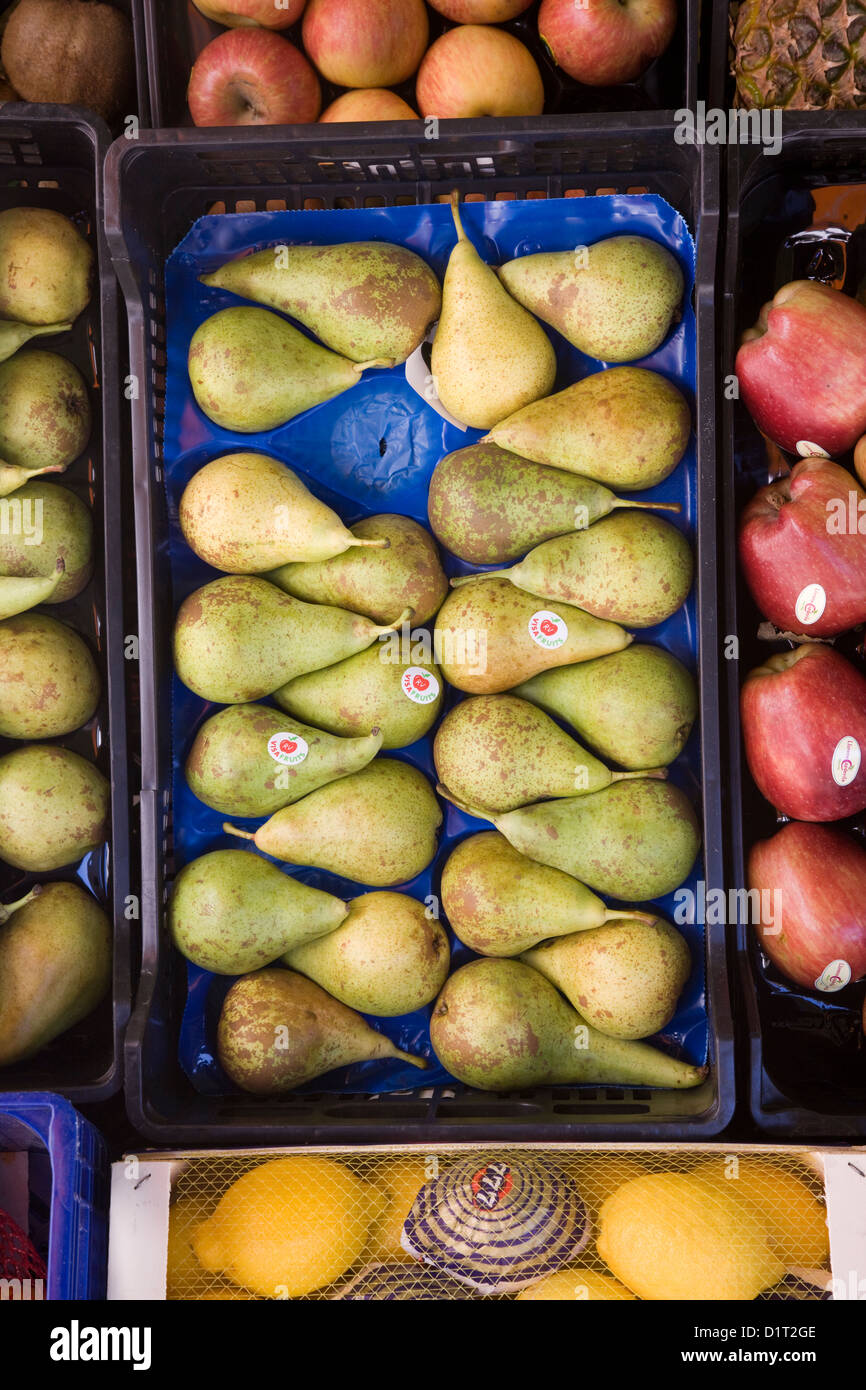 A tray of conference pears and other fruits outside a shop in Barcelona, Spain Stock Photo