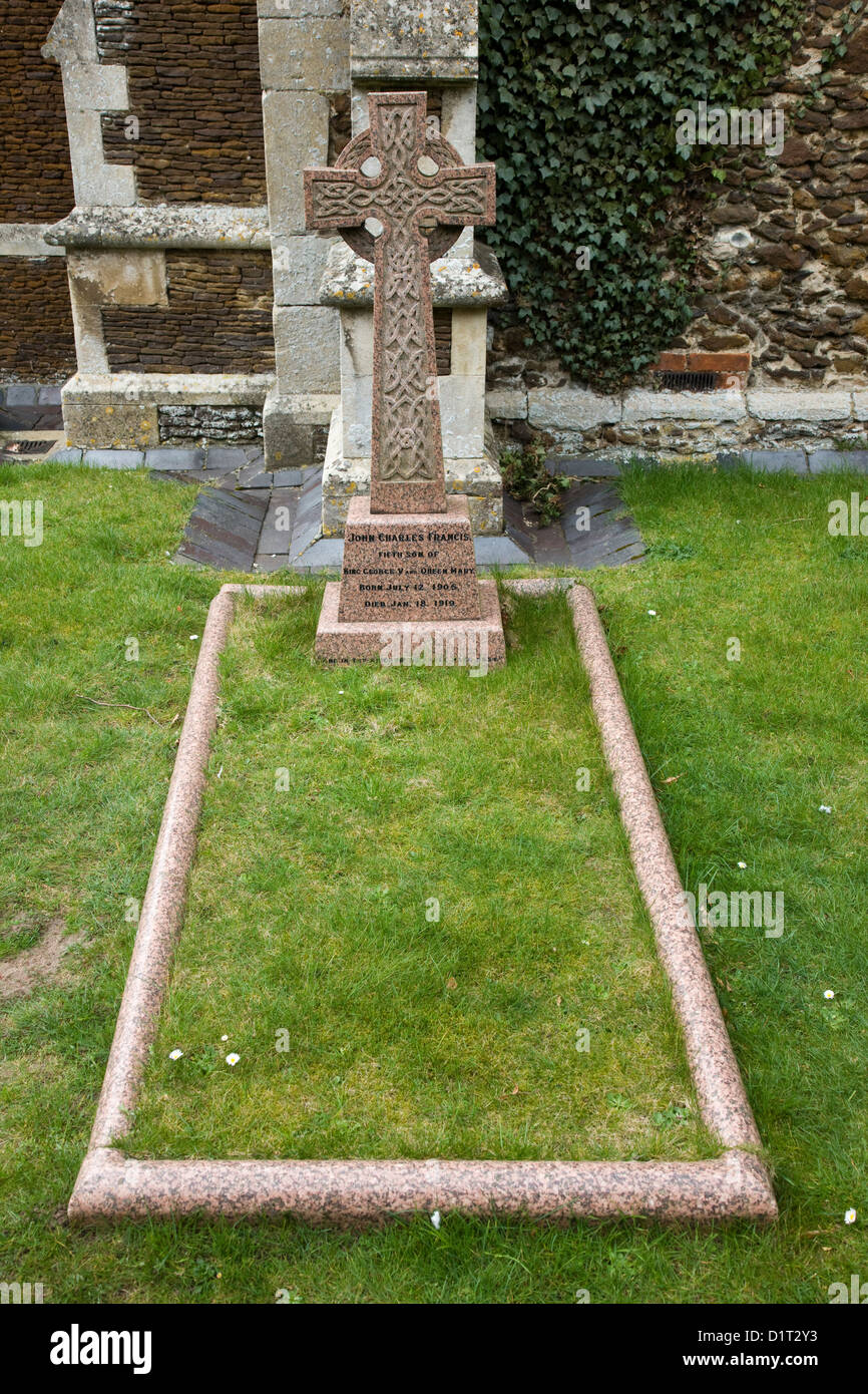 Grave and headstone of 'Prince John', son of King George V and Queen Mary, outside the church in Sandringham, Norfolk Stock Photo