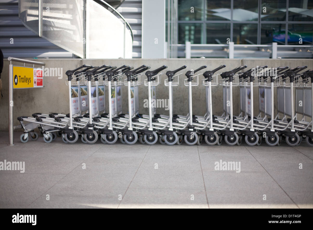 Row of Luggage trolleys, Heathrow, Terminal 5, Stock Photo