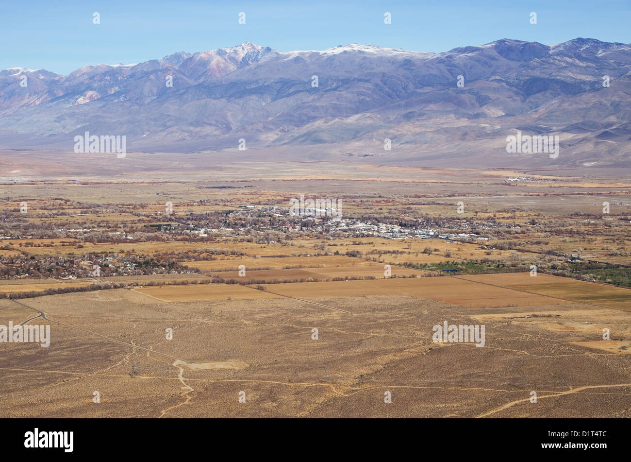 the city of Bishop and the White Mountains viewed from above in December Stock Photo