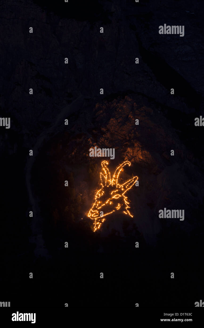 Mountain bonfires in Ehrwald basin during solstice in Tyrol, Austria. Stock Photo