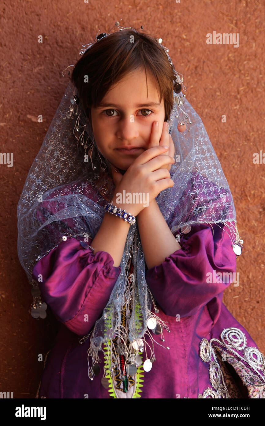 Portrait of a young iranian girl wearing traditional floreal chador, Abyaneh, Iran Stock Photo