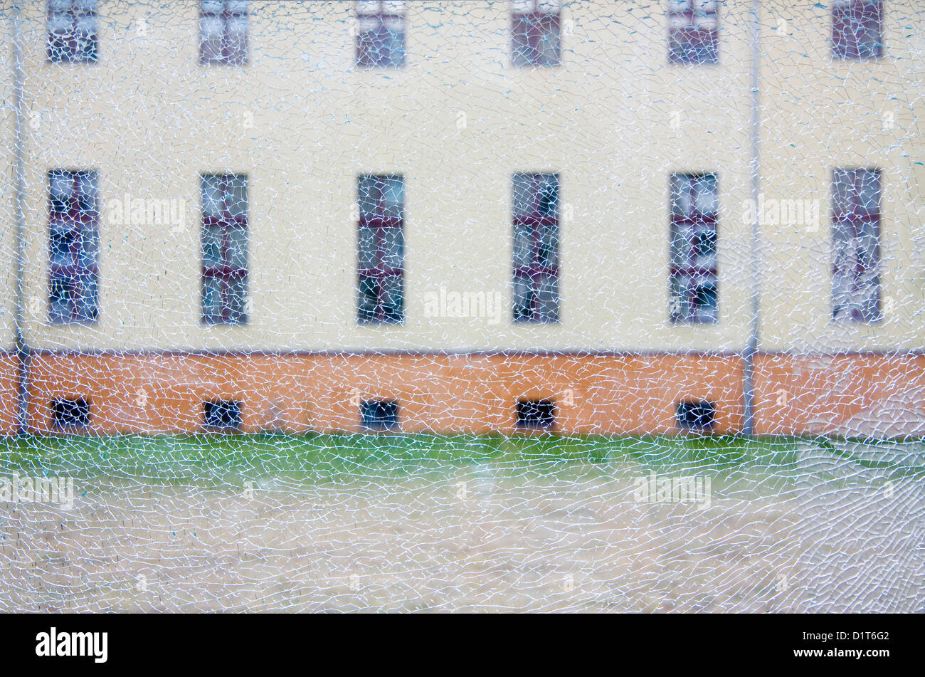 Berlin, Germany, a facade behind a chipped plate Stock Photo
