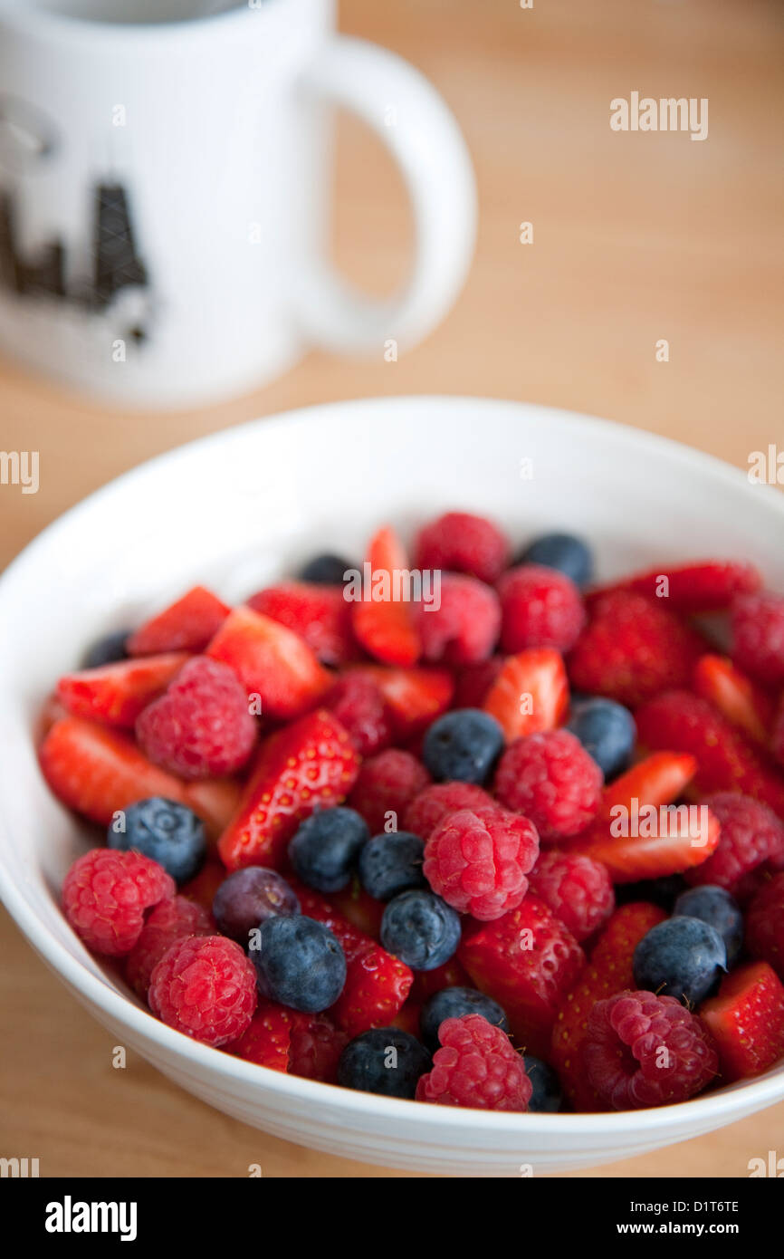 A bowl of mixed berries and part of a well balanced healthy diet Stock Photo