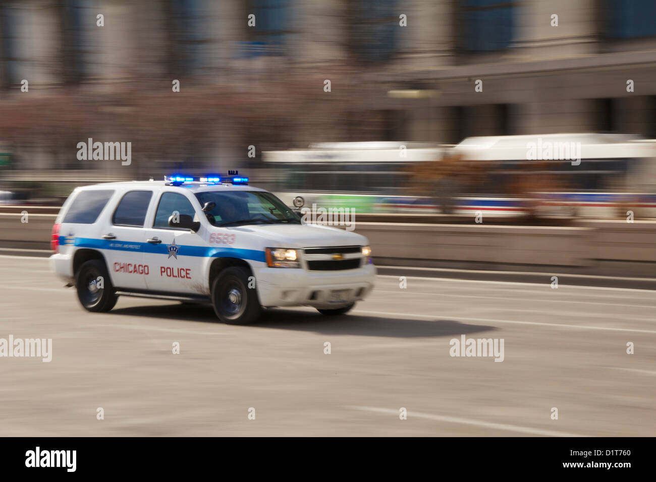 Chicago Police SUV on emergency call speeding along Michigan Avenue. Motion blur. Stock Photo