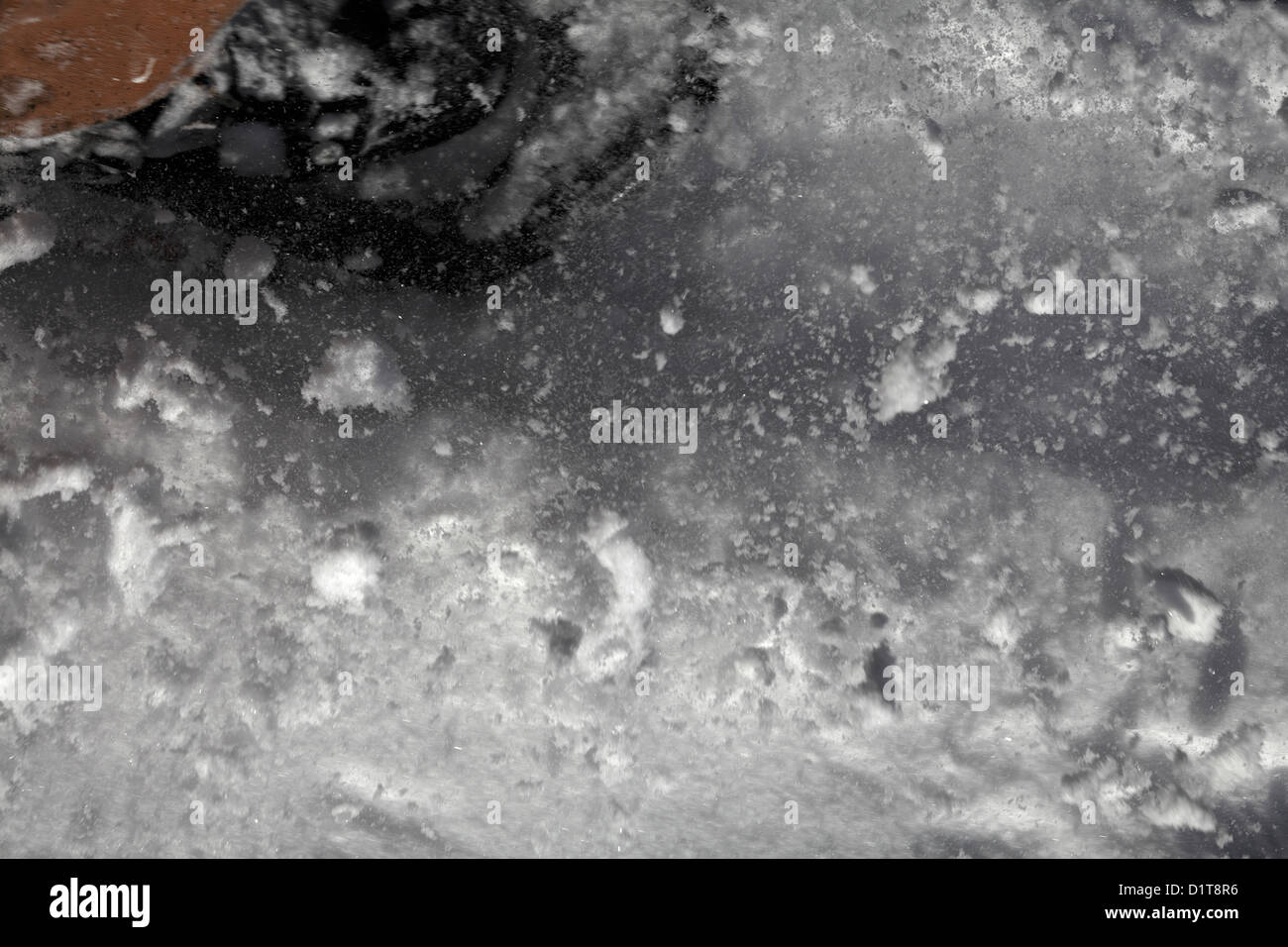 Snow particles in the air ahead of a snowshoe. Stock Photo