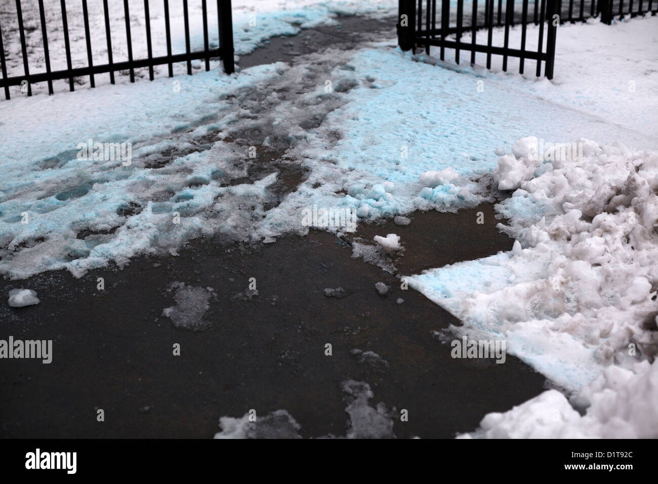 Bluetinted icemelt substance on concrete, melting ice Stock Photo Alamy