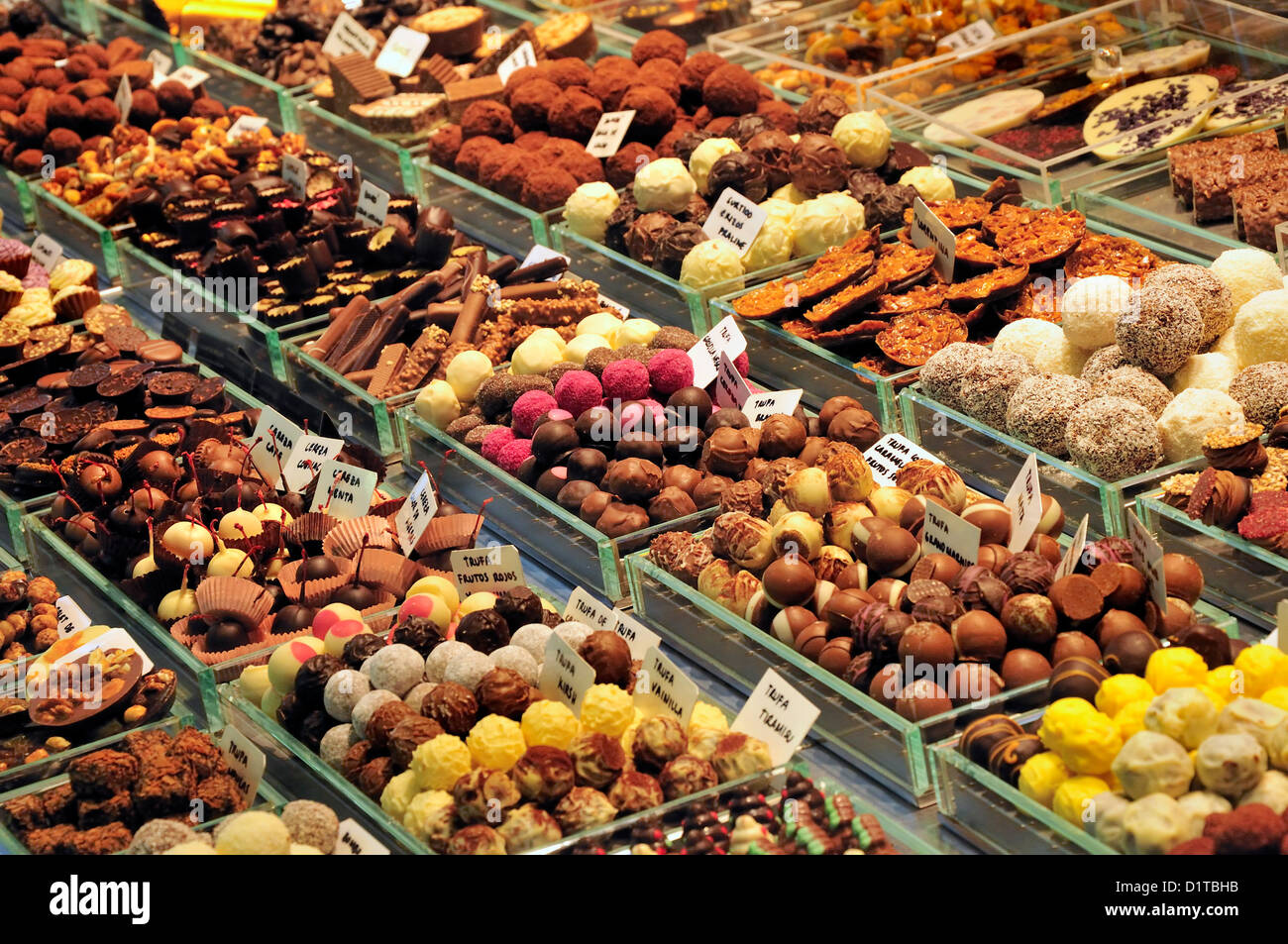 Barcelona, Spain. La Boqueria market (c1840) Chocolate stall - truffles Stock Photo