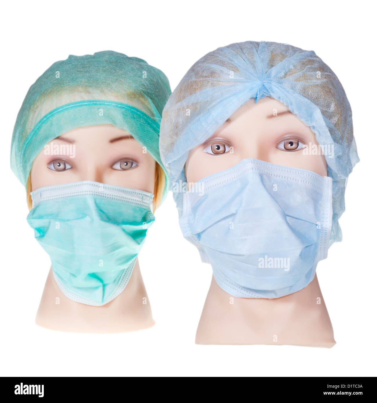 two female mannequin doctor heads wearing textile surgical cap and medical protective mask