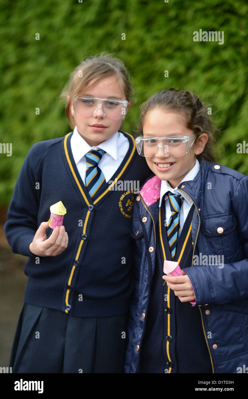 School girls during an outdoor rocket launch science lesson at Our Lady & St. Werburgh's Catholic Primary School in Newcastle-un Stock Photo