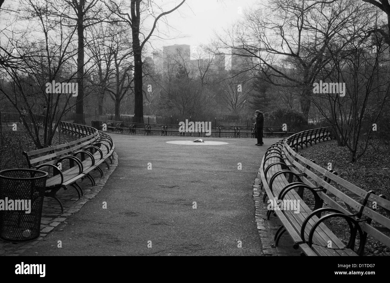 Two people at John Lennon memorial,Central Park, New York Stock Photo