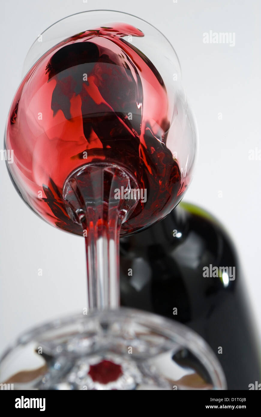 Vine pouring in a glass view from bottom unusual point of view stock