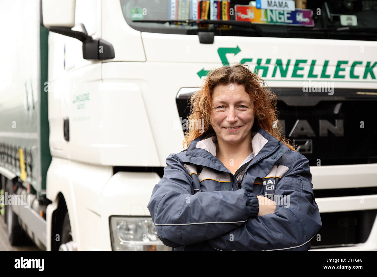 Braunschweig, Germany, trucker Inge lawn in front of her truck Stock Photo