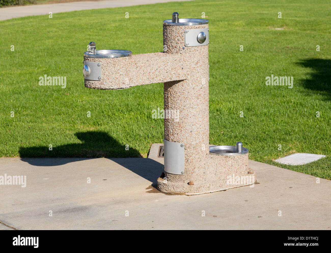 Wheelchair accessible drinking fountain in park in California Stock