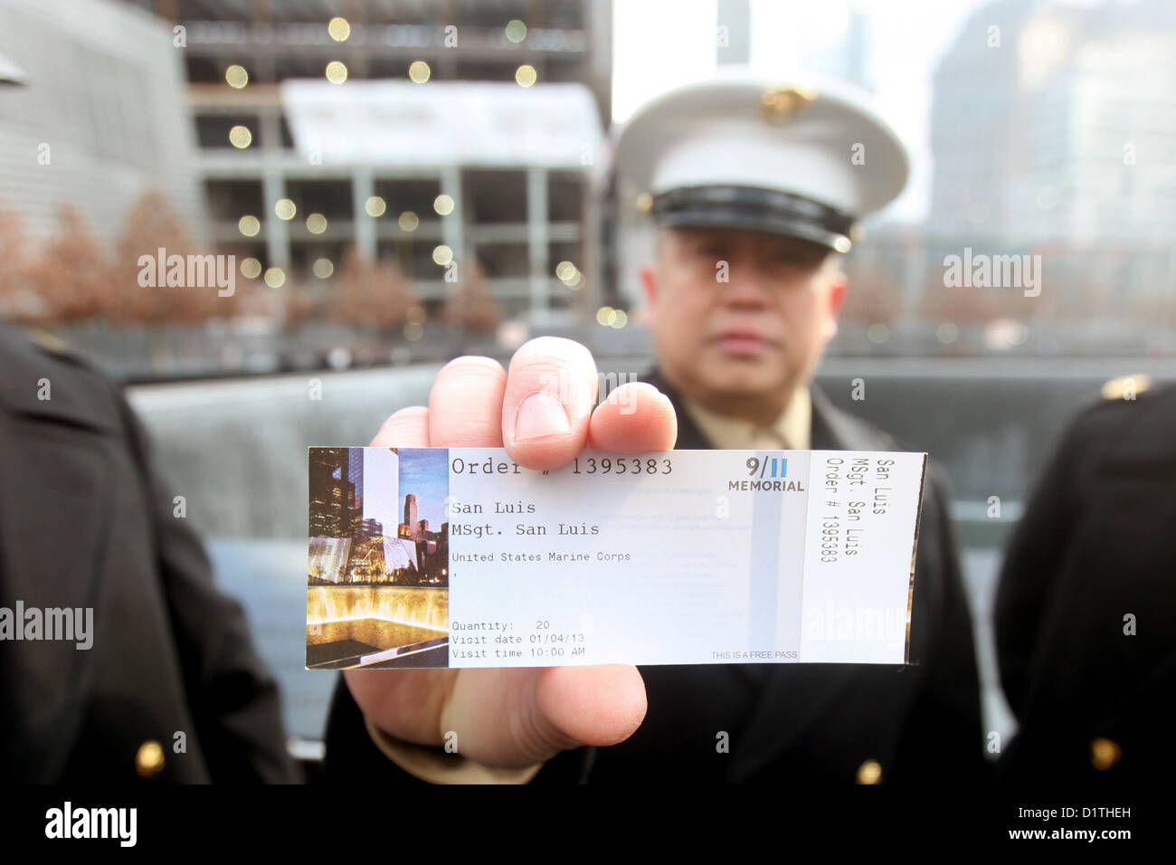 NEW YORK – Master Gunnery Sgt. Fernando San Luis, a member of the 1st Marine Corps District’s Contact Team, shows off the last piece of paper he received with the rank master sergeant before his name.  San Luis, a native of Guam, was promoted to his current rank at a promotion ceremony inside the 9/11 Memorial here Jan. 4.  (U.S. Marine Corps photo by 1st Lt. Timothy R. Irish). Stock Photo