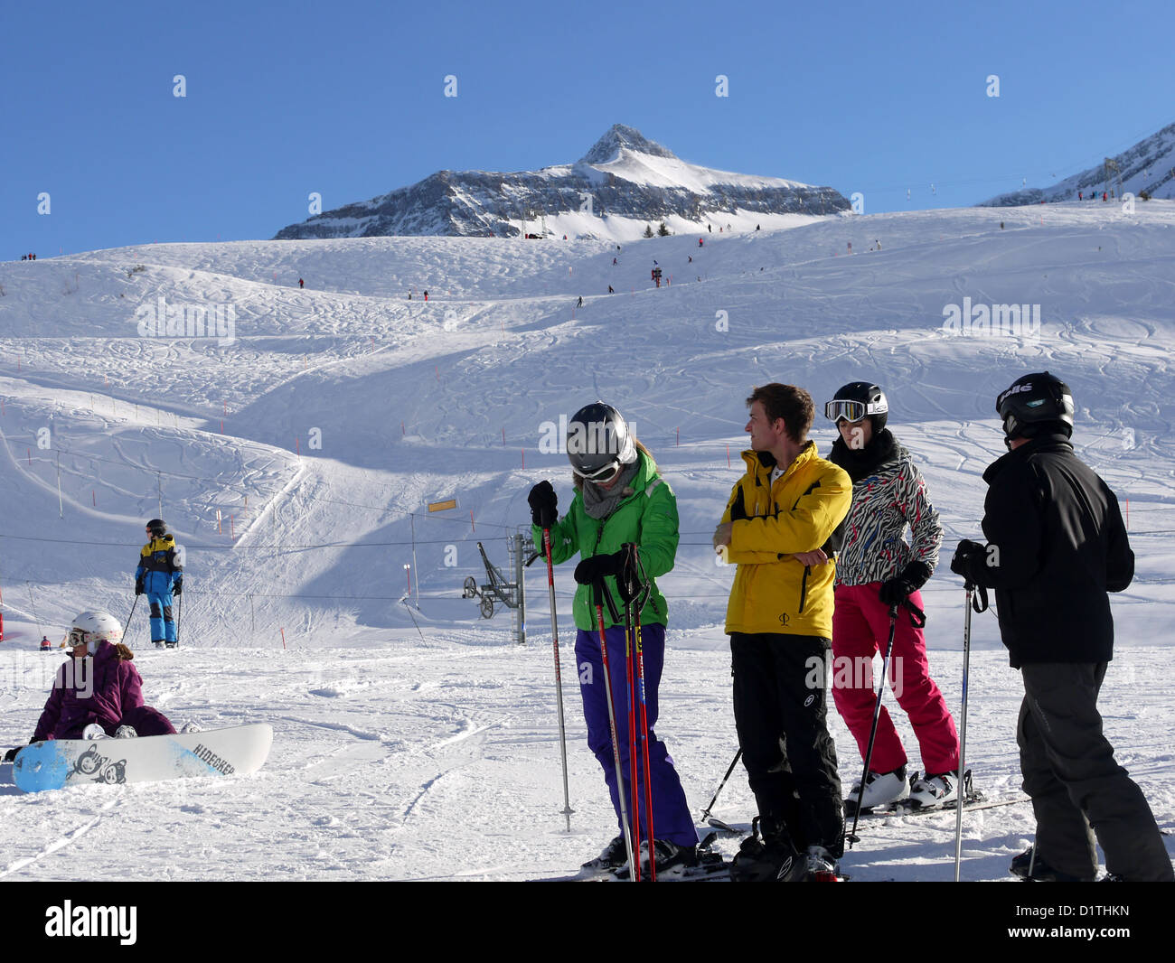 Group of skiers and snowboarders on the slopes of Iseanau at Les Diablerets  ski resort in Switzerland Stock Photo - Alamy