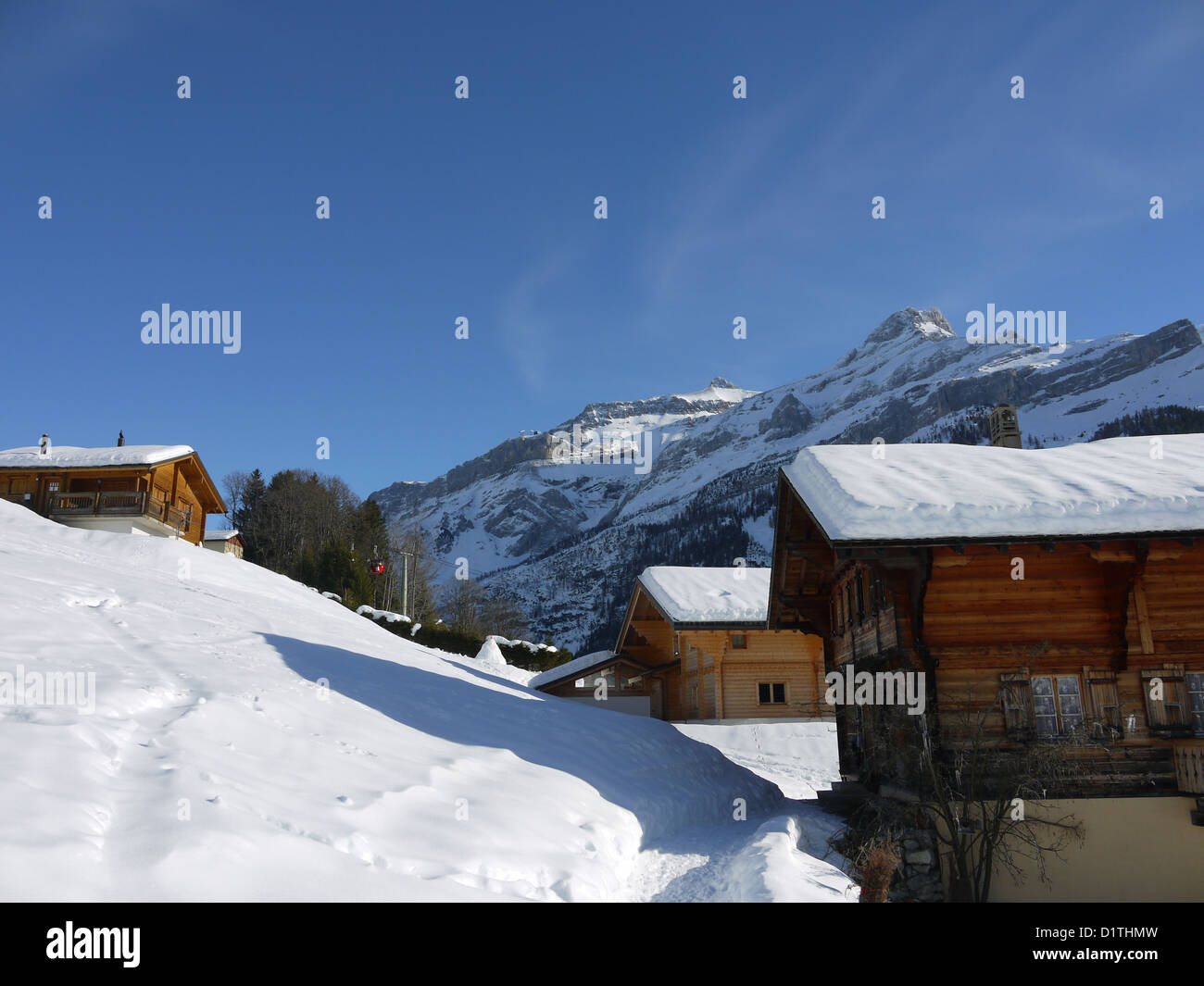Wooden chalets old and new in the ski resort of Les Diablerets, Switzerland. Stock Photo