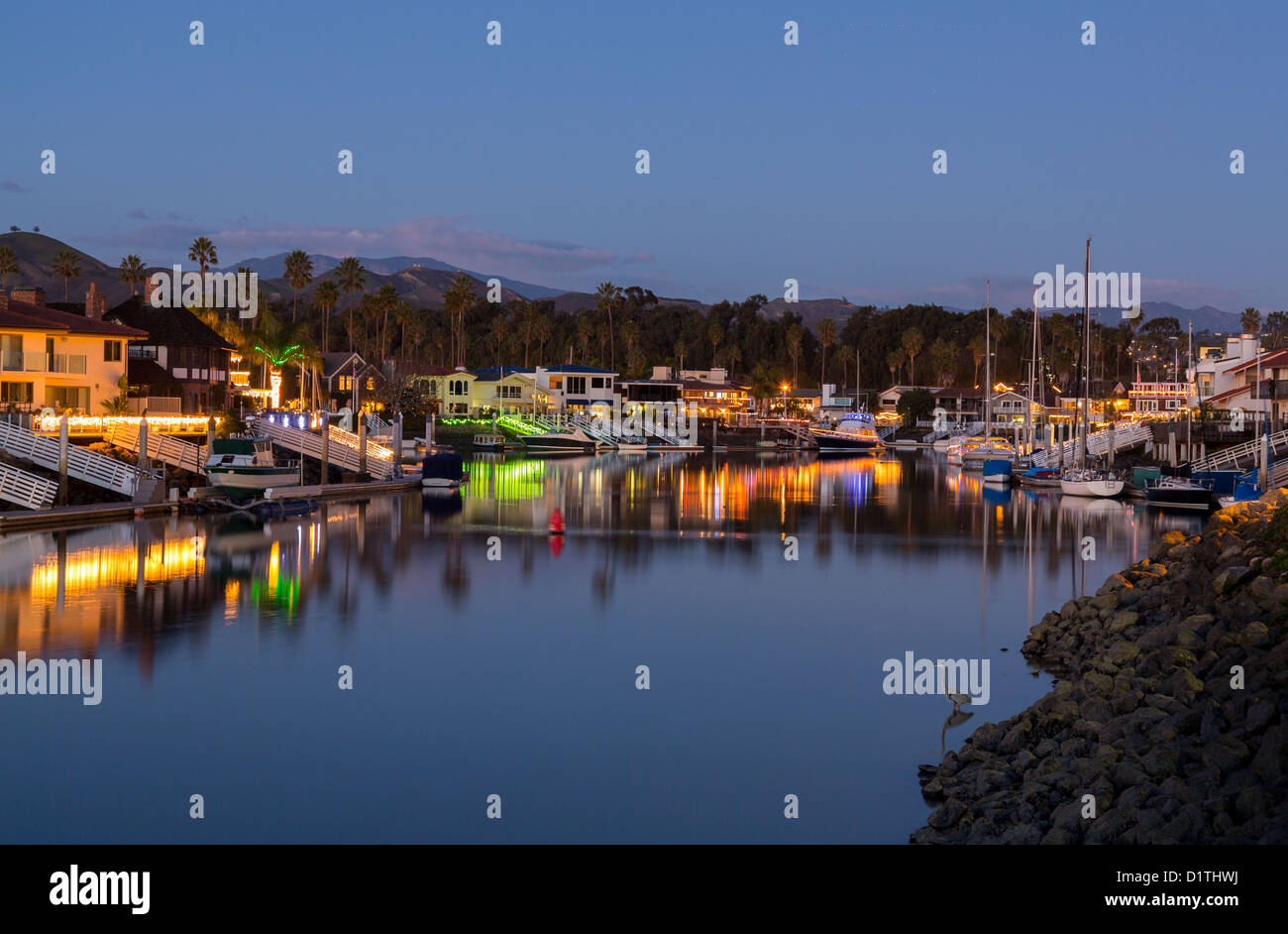 Sunset over luxury residential development with marina in Ventura, California, USA with modern homes and yachts boats Stock Photo