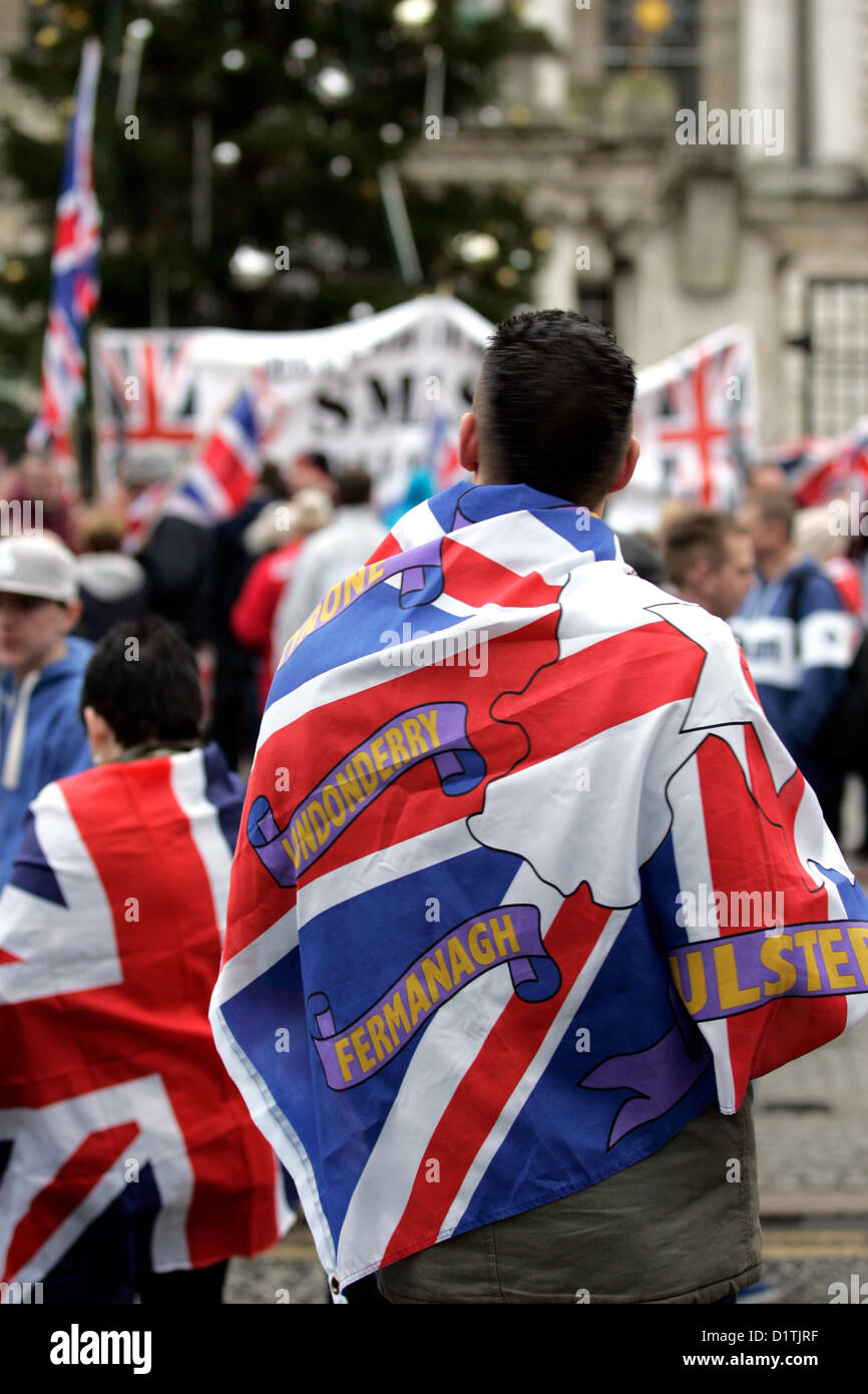 Belfast Uk 5th Jan 2013 A Man Drapes A Union Jack Flag Which