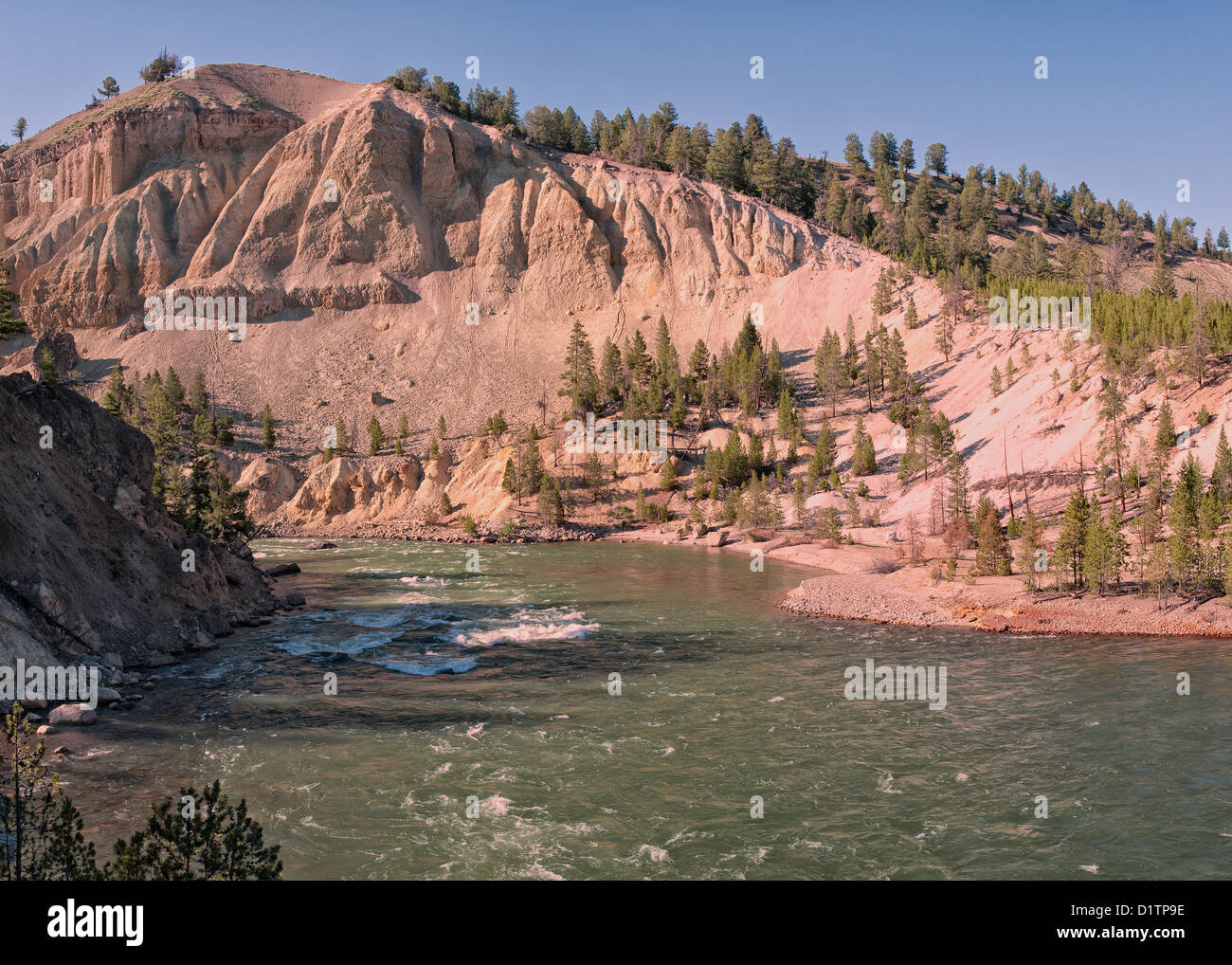 The Yellowstone River curves on its pass by Tower Falls. Stock Photo