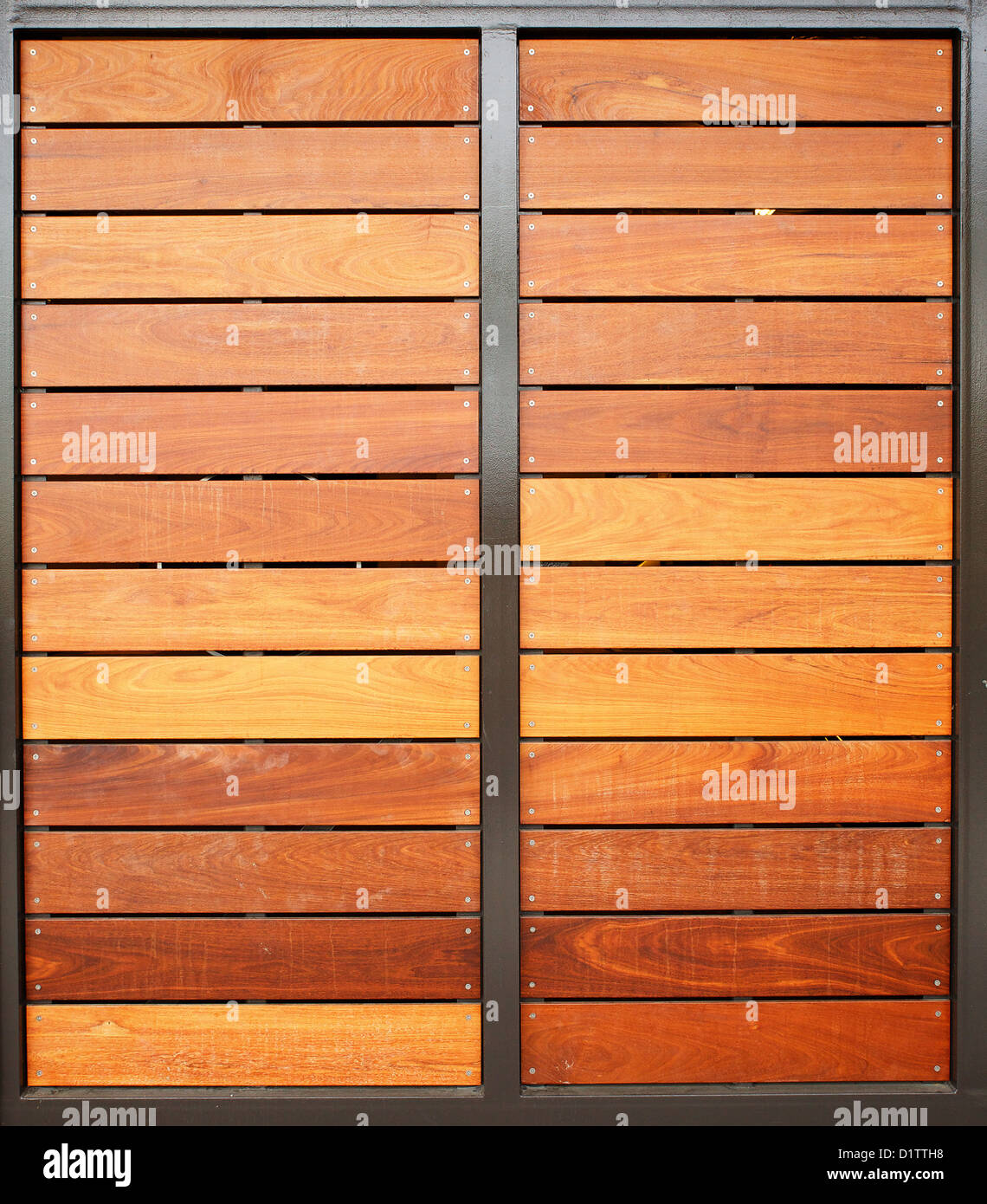 Stained Wood Framed In Steel Garage Doors Vertical Stock Photo