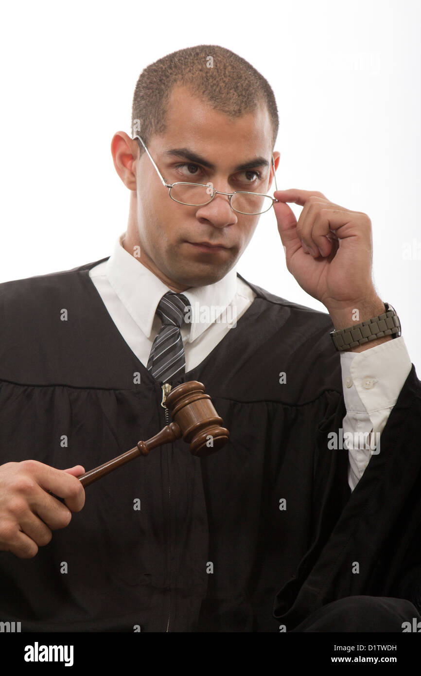 Young african american judge holding gavel Stock Photo