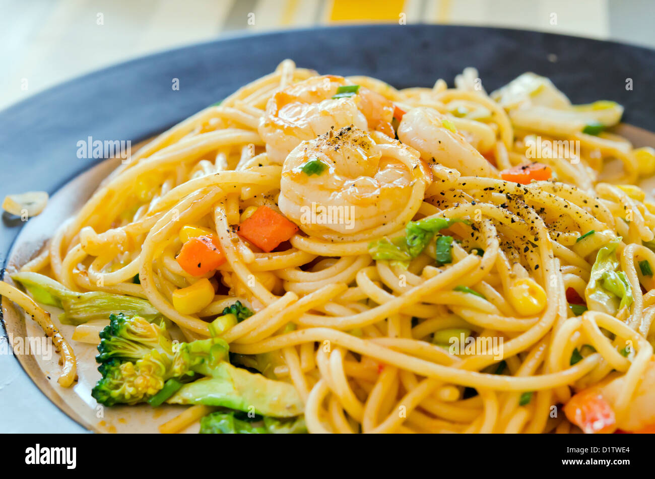 pasta with tomato sauce , shrimp and vegetable Stock Photo