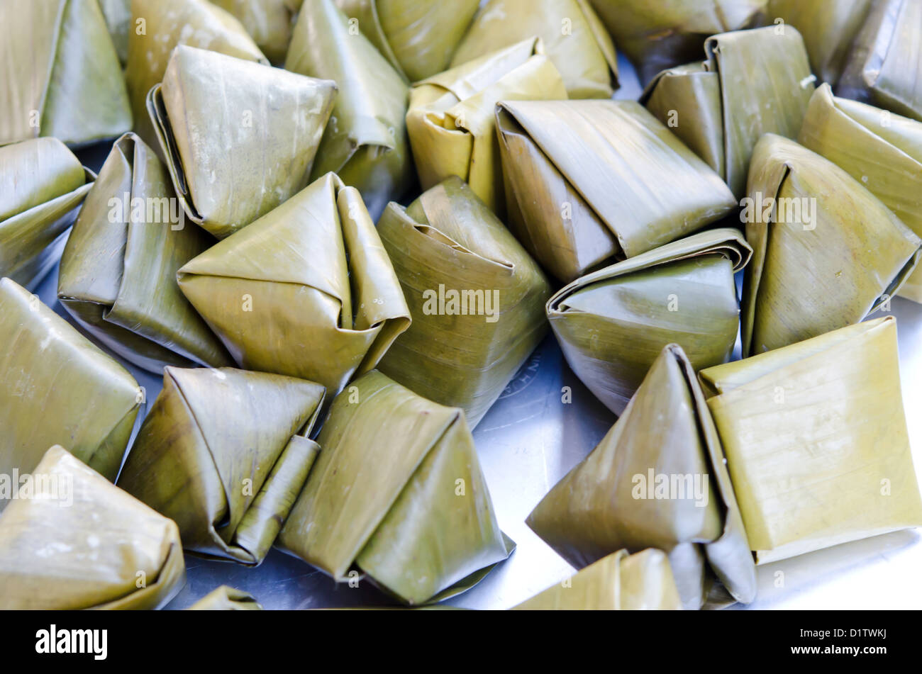 Sweet sticky rice in banana leaf package Stock Photo