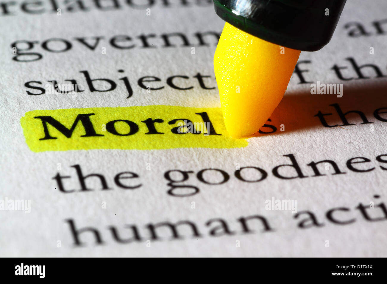 Word moral highlighted with a yellow marker Stock Photo