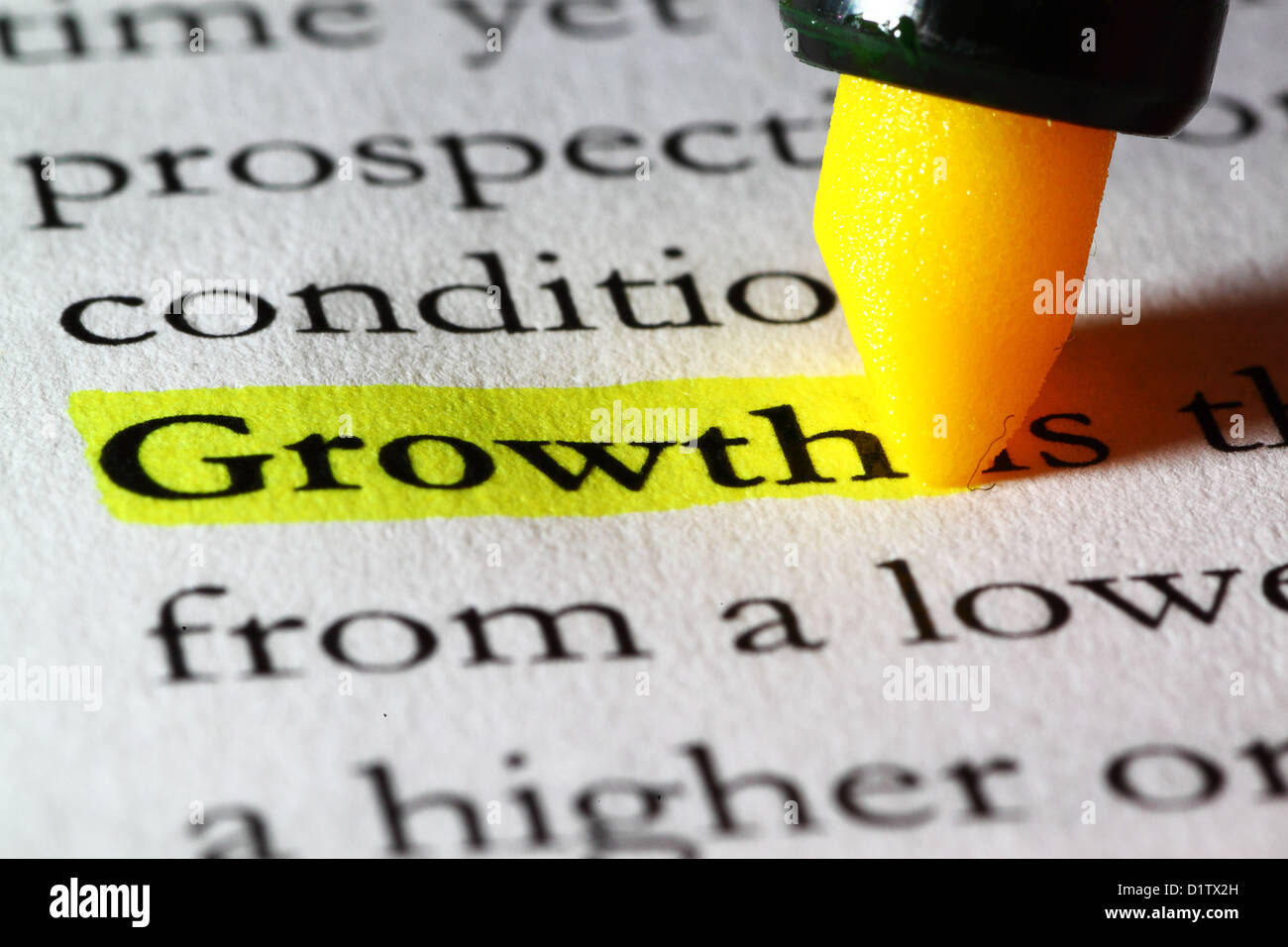 Word growth highlighted with a yellow marker Stock Photo