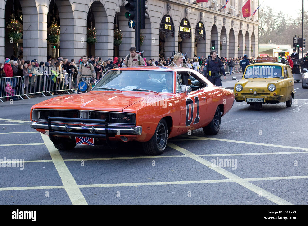 The General Lee And Trotters Independent Trading Car from Dukes of Hazard and Only fools and Horses in London Parade Stock Photo