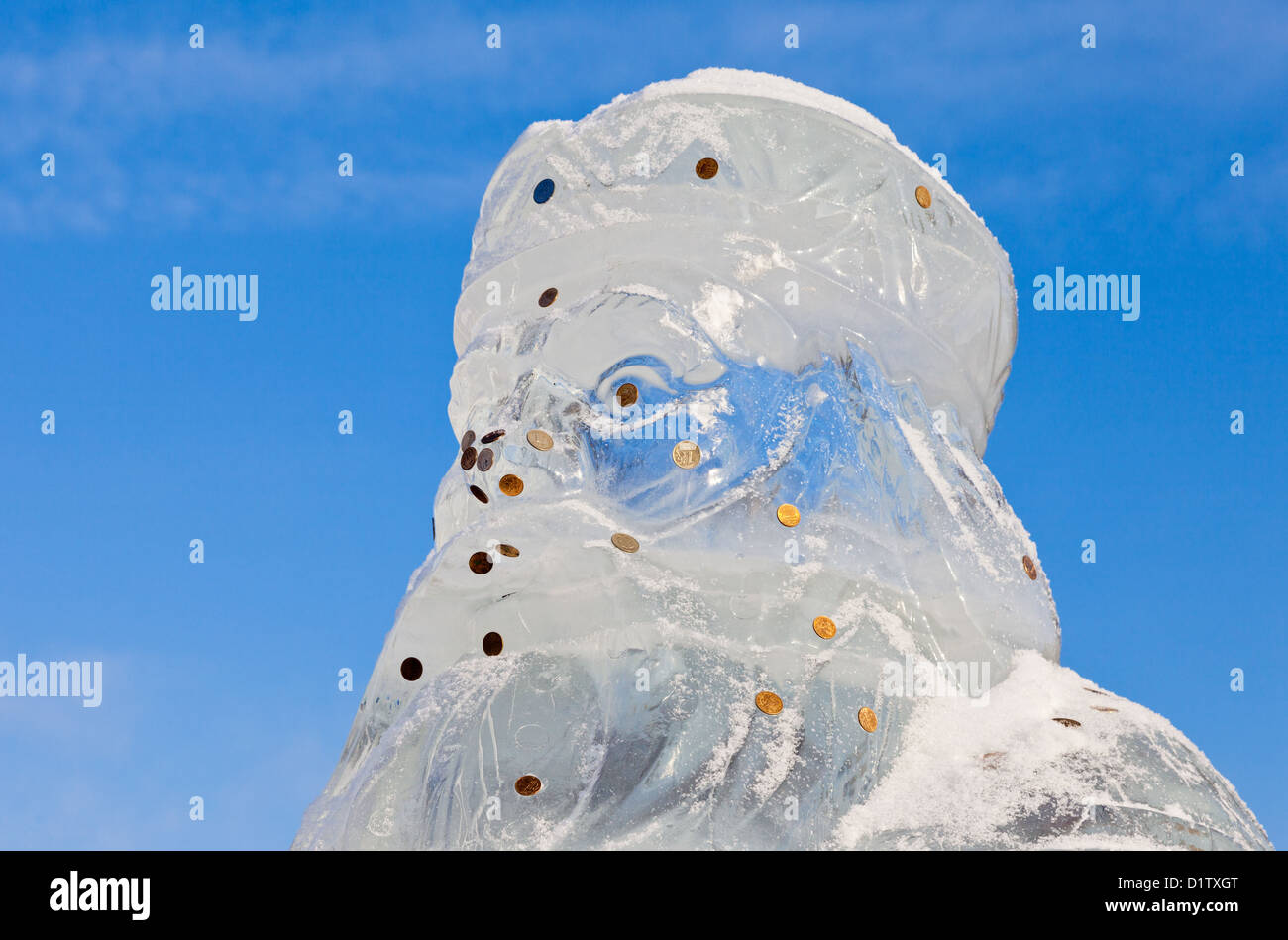 Ice sculpture of Santa Claus over blue sky Stock Photo Alamy