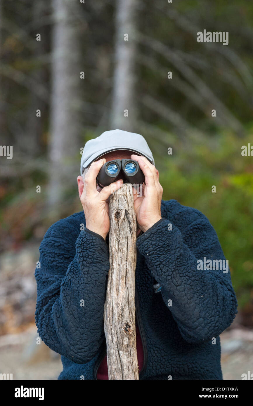 Man scouts with binoculars Stock Photo Alamy