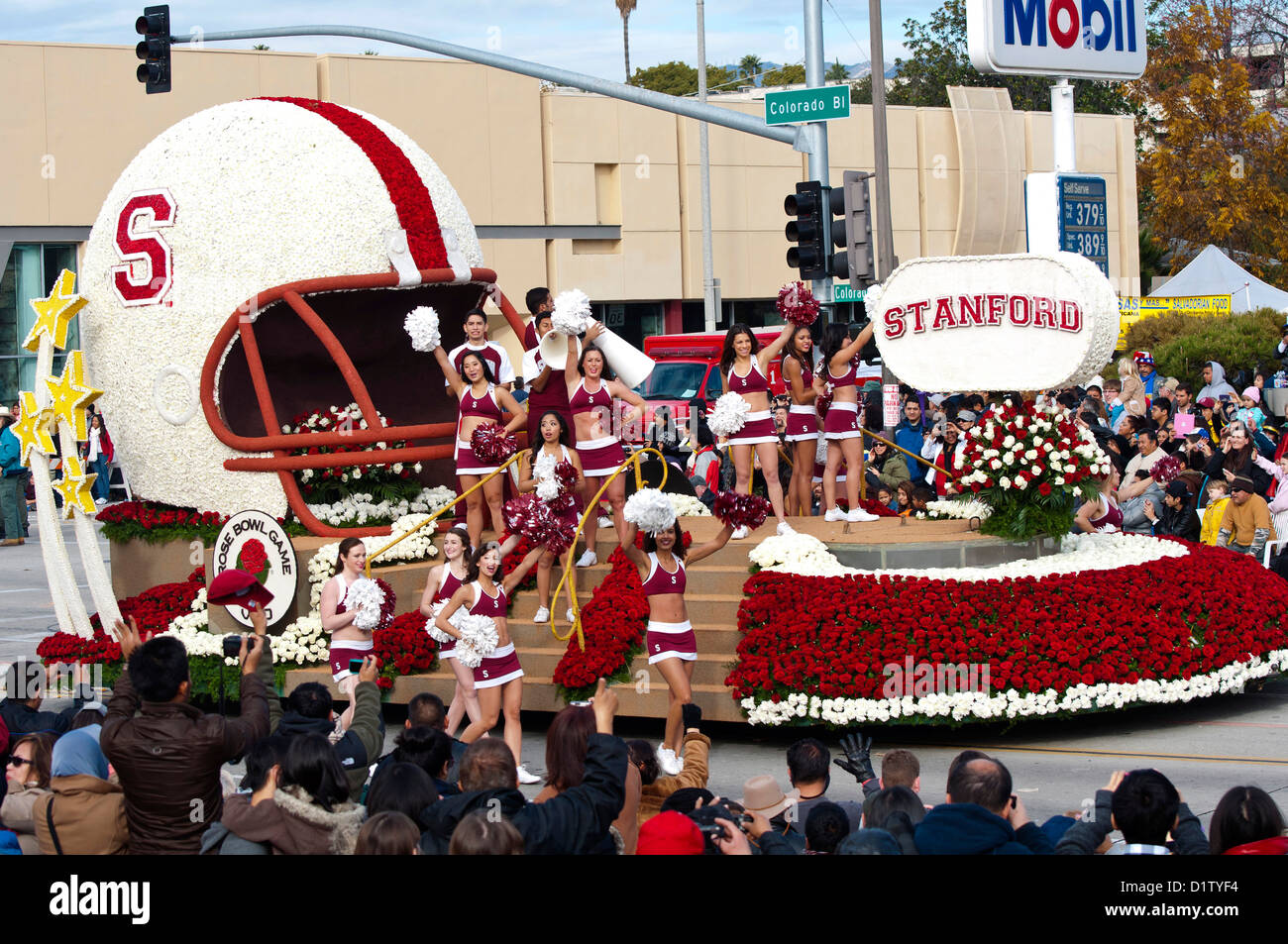 Cheerleaders Stanford University float, football helmet, 124th Rose Parade in Pasadena