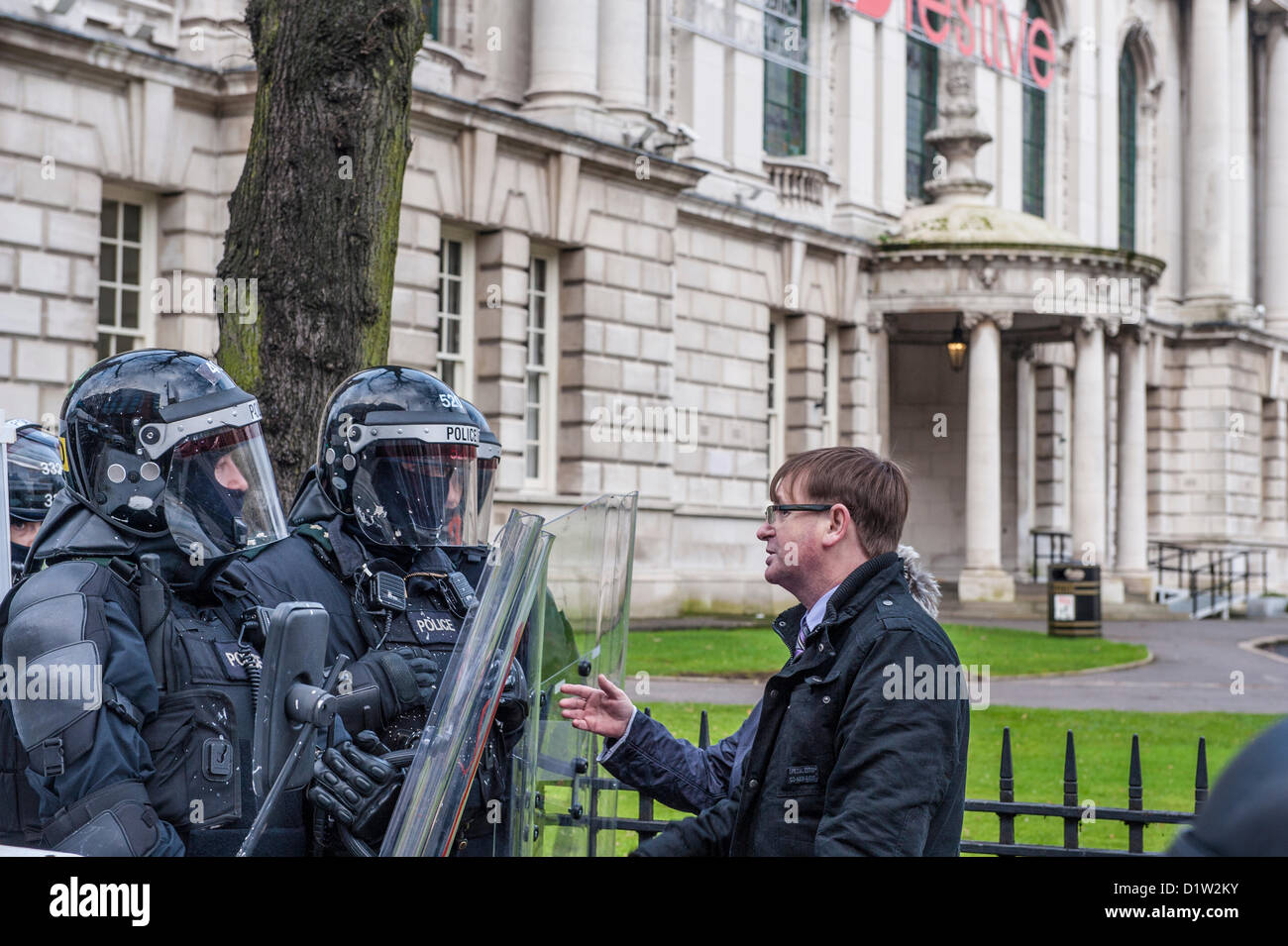 Saturday 5th January 2013, Belfast, Northern Ireland, UK.Willie Frazer of FAIR held by police at Belfast City Hall Flag Protest. Alamy Live News. Stock Photo