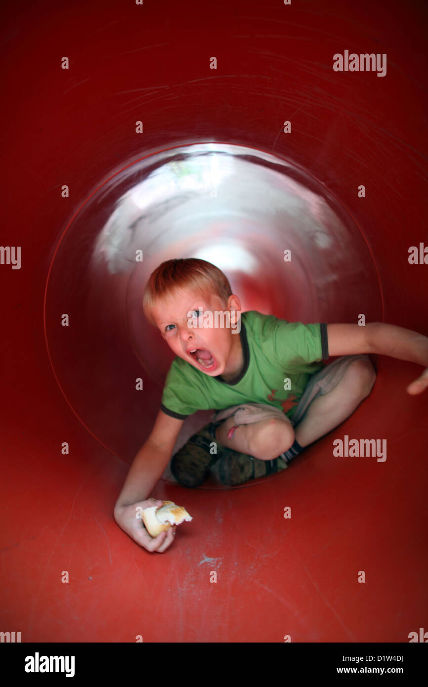 Child crawling through tunnel hires stock photography and images Alamy