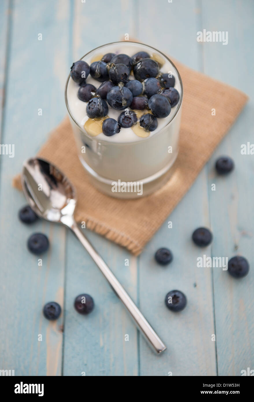Blueberries in natural yoghurt with drizzled honey, dessert or snack