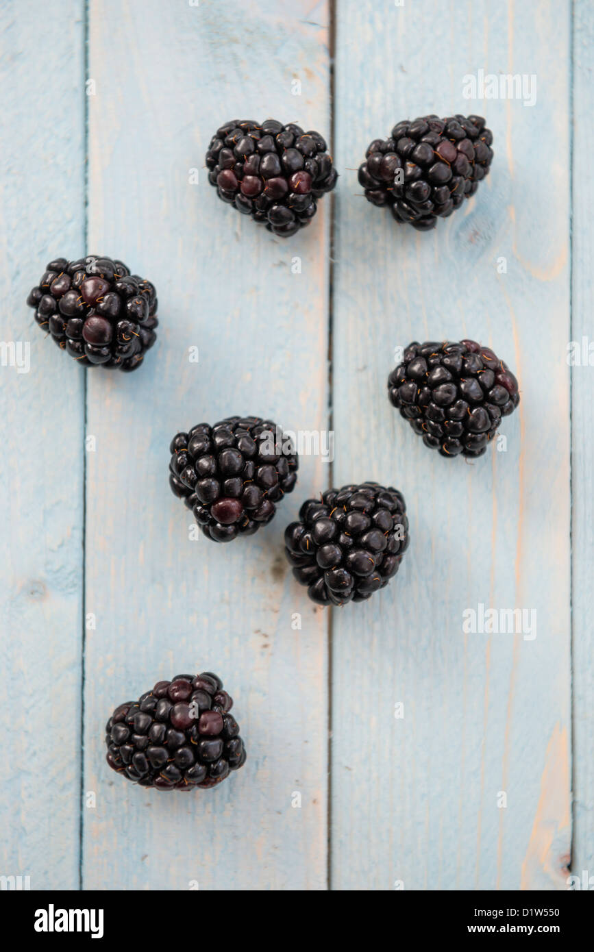 Blackberries on a wooden surface Stock Photo