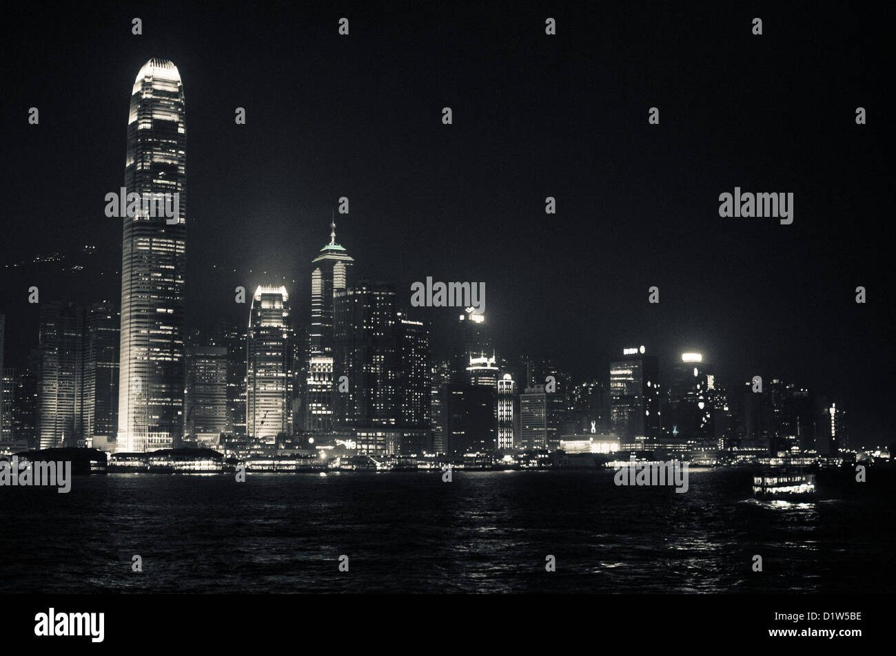 city skyline of victoria harbour at night, Hong Kong, China. Stock Photo