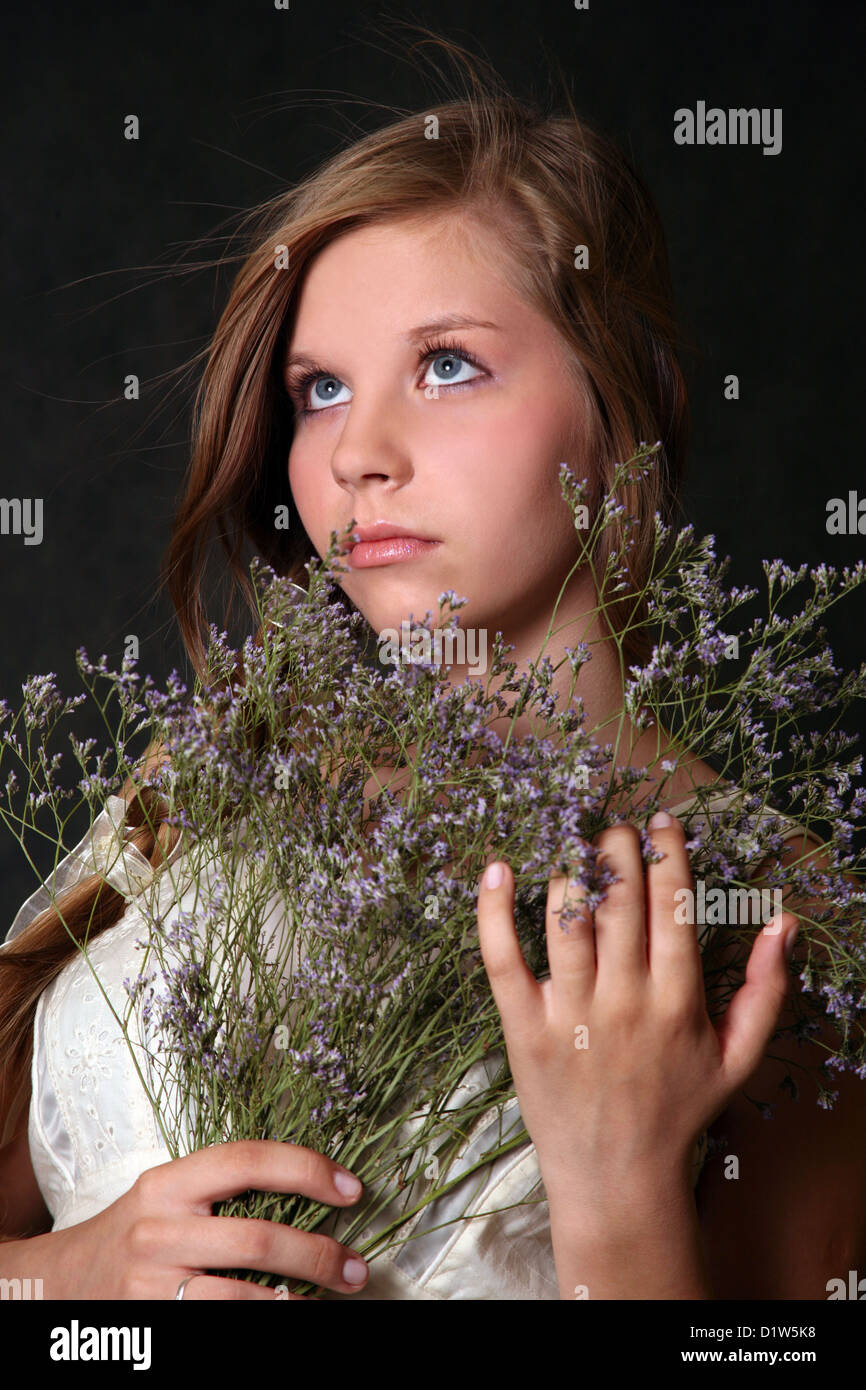 The girl with a bouquet from field flowers Stock Photo Alamy