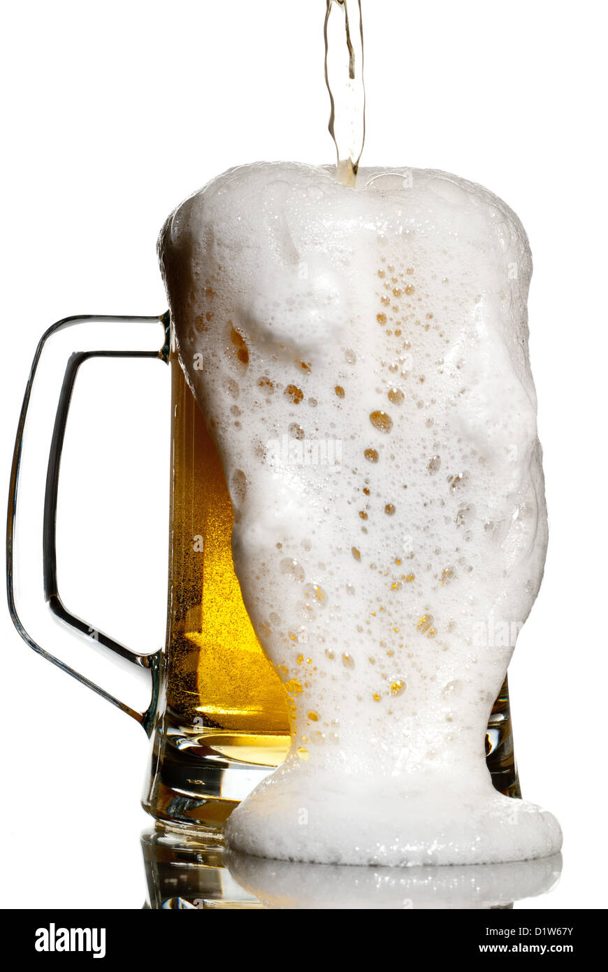 Overflowing beer from a heavy keg isolated on white Stock Photo Alamy