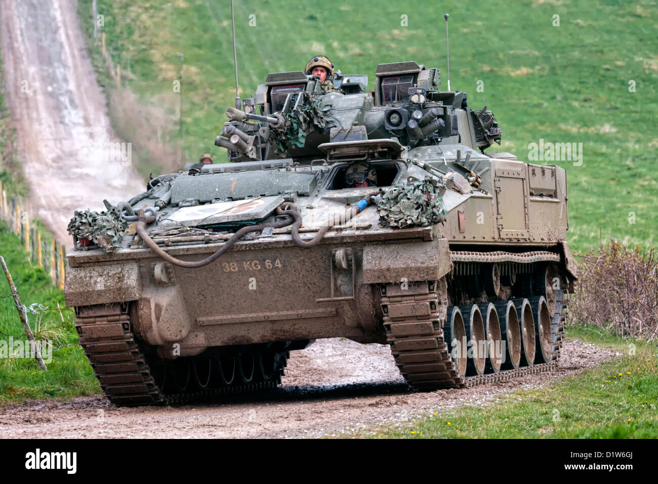 A British Army Warrior Infantry Fighting Vehicle on the Salisbury Plain Military Training Area in Wiltshire, United Kingdom. Stock Photo