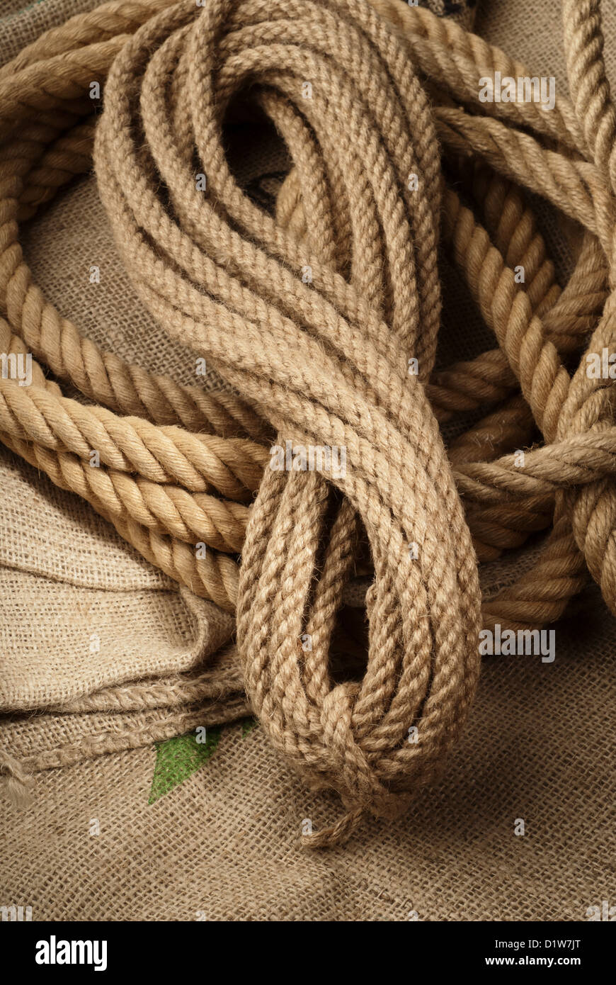 Natural ropes twisted on a brown cloth Stock Photo Alamy